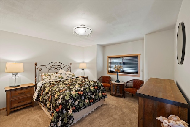 bedroom featuring light carpet