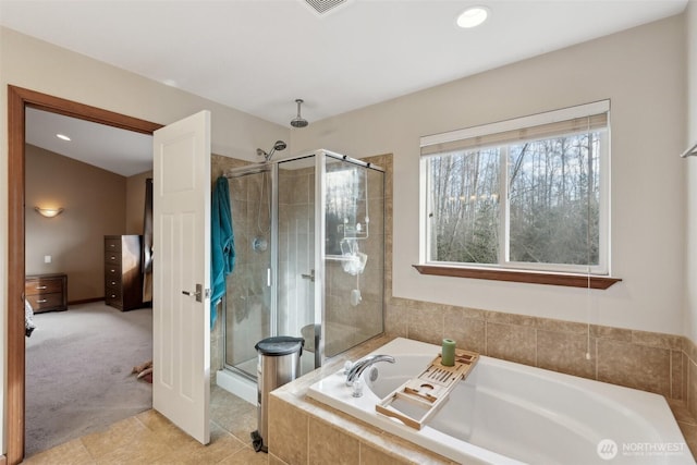 full bathroom with a bath, tile patterned floors, a stall shower, and ensuite bathroom