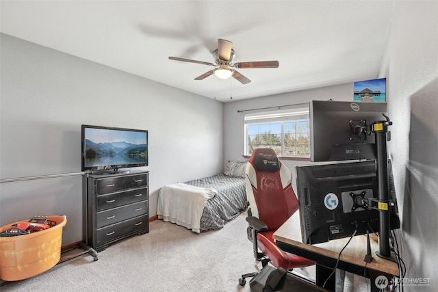 carpeted bedroom with a ceiling fan