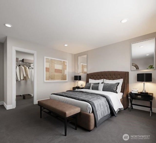 bedroom featuring baseboards, carpet, a walk in closet, a closet, and recessed lighting