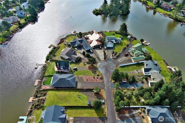 bird's eye view with a water view and a residential view