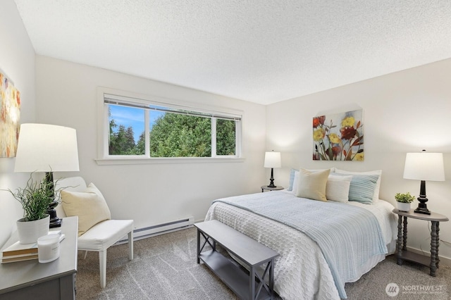 carpeted bedroom with a textured ceiling, a baseboard radiator, and baseboards