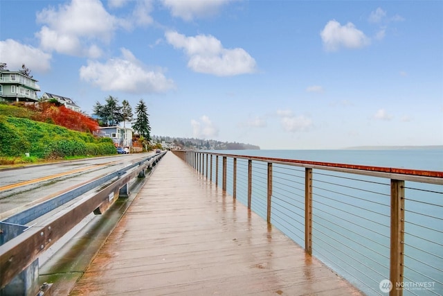 view of dock with a water view