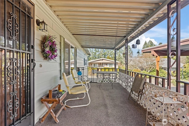 balcony featuring covered porch