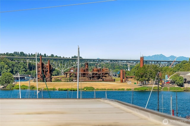 view of swimming pool with a water view