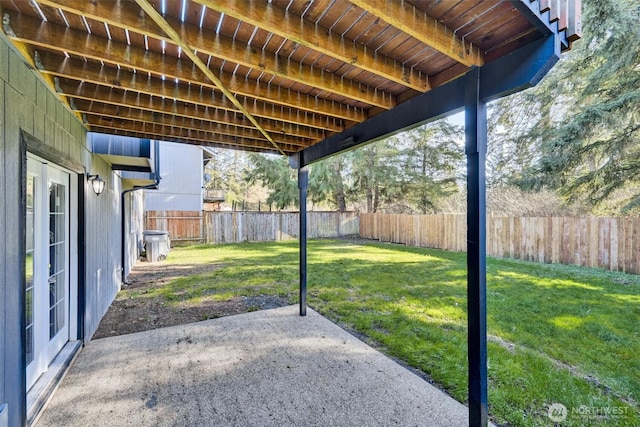 view of yard featuring a patio area and a fenced backyard