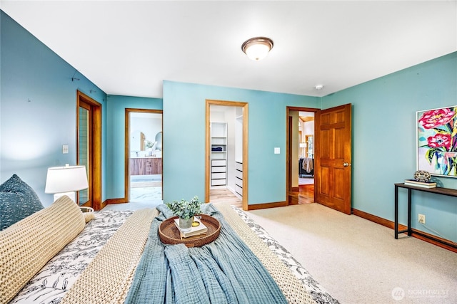 bedroom with baseboards and carpet flooring