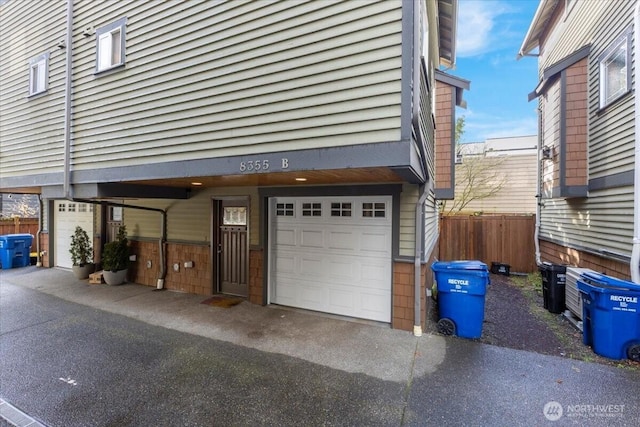 garage featuring fence