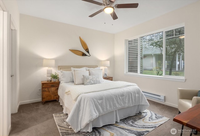 bedroom featuring carpet, baseboards, ceiling fan, and baseboard heating