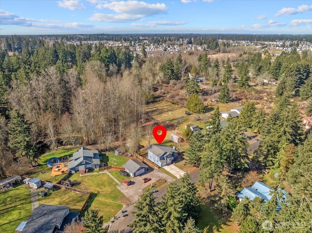 drone / aerial view with a forest view