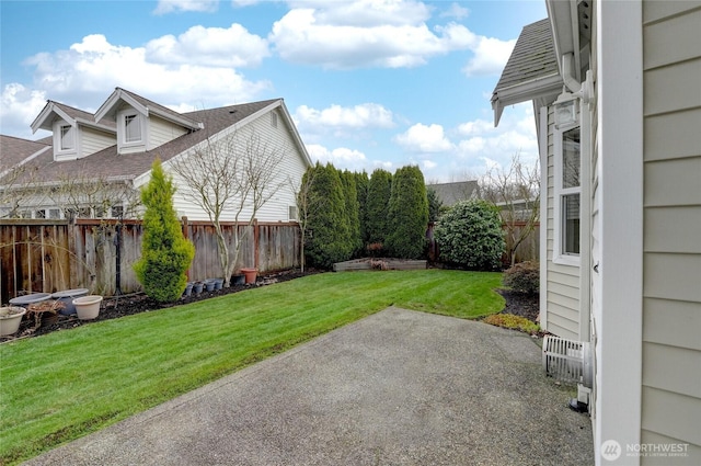 view of yard with a patio area and fence