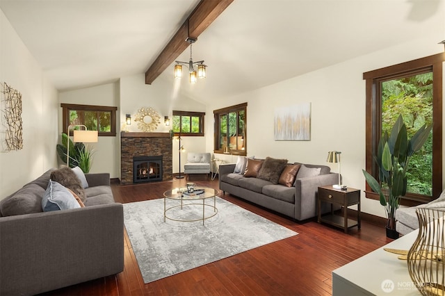 living area featuring lofted ceiling with beams, dark wood-style floors, and a fireplace