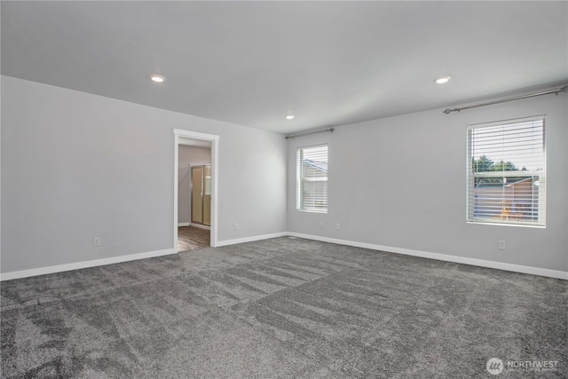 carpeted spare room with baseboards and recessed lighting