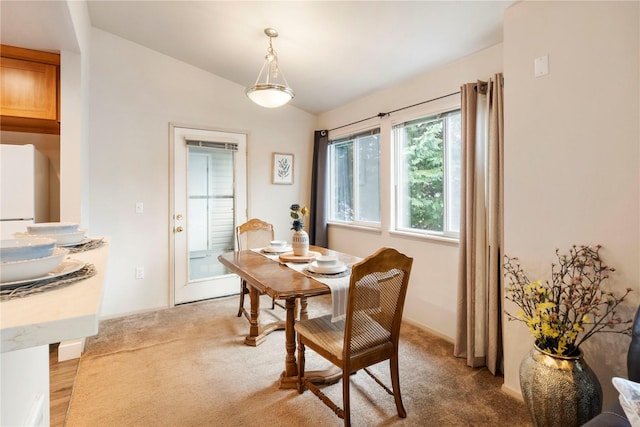 11130 SE 208th St Unit J204, Kent, WA 98031 - dining area with light colored carpet and vaulted ceiling