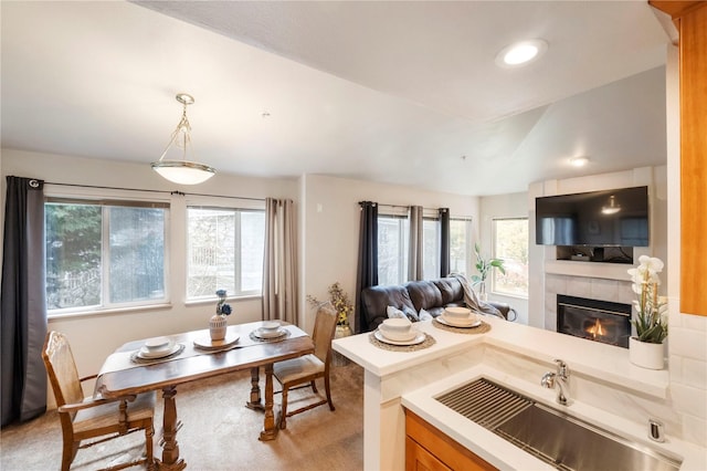 11130 SE 208th St Unit J204, Kent, WA 98031 - kitchen with light countertops, a healthy amount of sunlight, a sink, and open floor plan