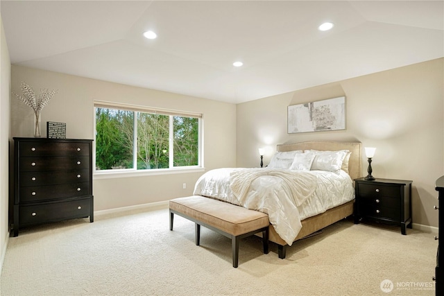 bedroom with recessed lighting, baseboards, light colored carpet, and vaulted ceiling