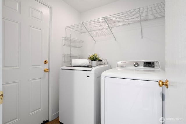 washroom with laundry area and separate washer and dryer