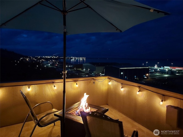 exterior space with an outdoor fire pit
