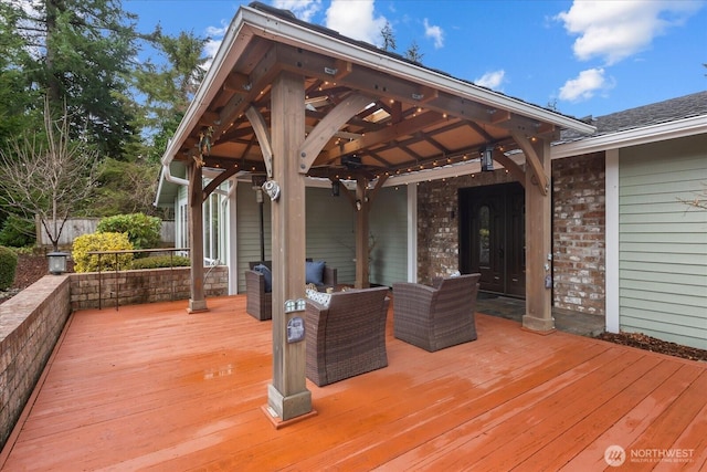 wooden deck with a gazebo