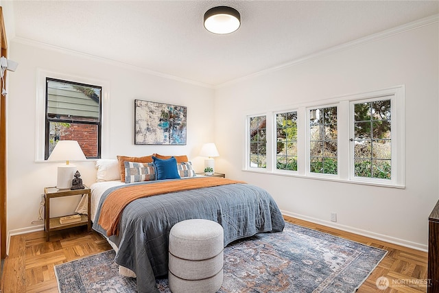 bedroom featuring baseboards and ornamental molding