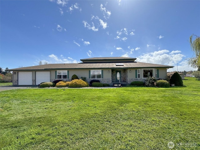 602 Mccomb Rd, Sequim, WA 98382 - view of front of house with driveway, an attached garage, and a front lawn