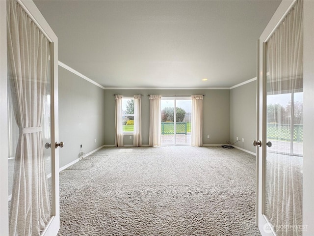 602 Mccomb Rd, Sequim, WA 98382 - unfurnished room with crown molding, french doors, baseboards, and carpet