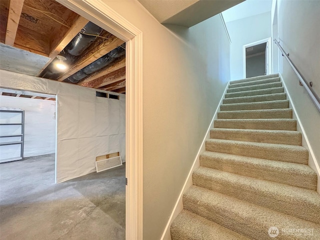 602 Mccomb Rd, Sequim, WA 98382 - stairway featuring unfinished concrete floors