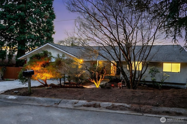 view of front facade with a shingled roof