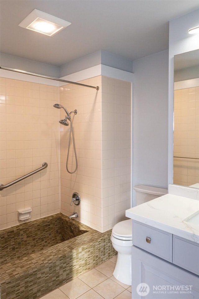 bathroom with shower / washtub combination, vanity, toilet, and tile patterned floors