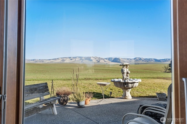 property view of mountains with a rural view