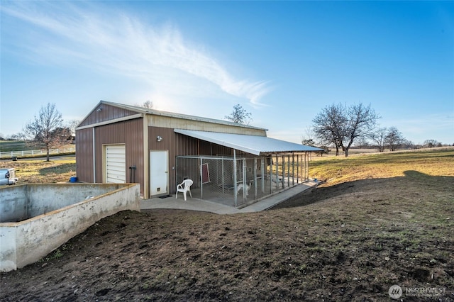 view of outbuilding featuring an outdoor structure