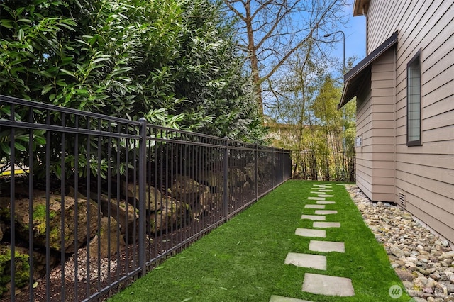 view of yard featuring fence