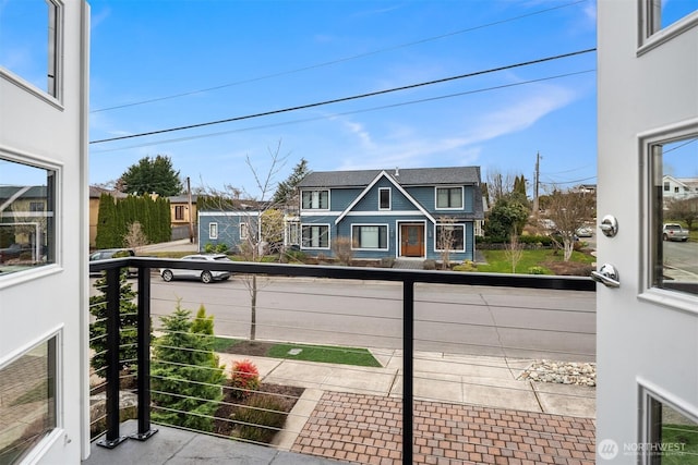 balcony featuring a residential view