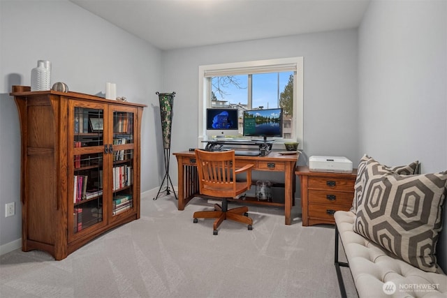 office area featuring carpet flooring and baseboards