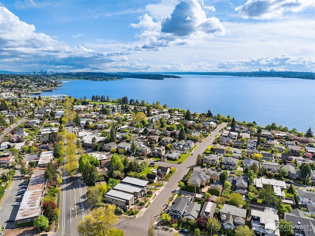 birds eye view of property featuring a residential view and a water view