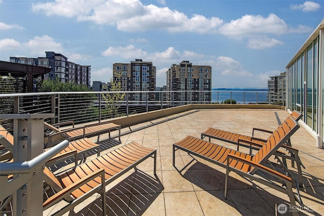 2821 2nd Ave Unit 1005, Seattle, WA 98121 - view of patio / terrace featuring a water view and a city view