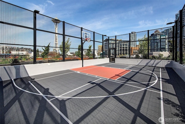 2821 2nd Ave Unit 1005, Seattle, WA 98121 - view of basketball court with a city view, fence, and community basketball court