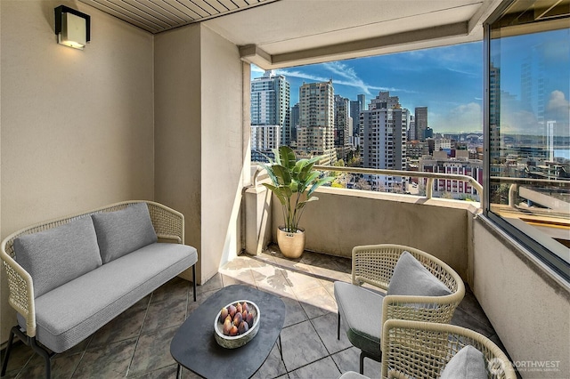 2821 2nd Ave Unit 1005, Seattle, WA 98121 - balcony with outdoor lounge area and a view of city