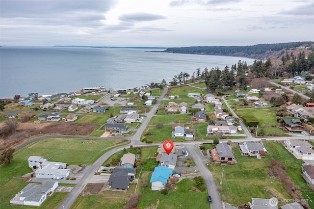 bird's eye view with a water view and a residential view