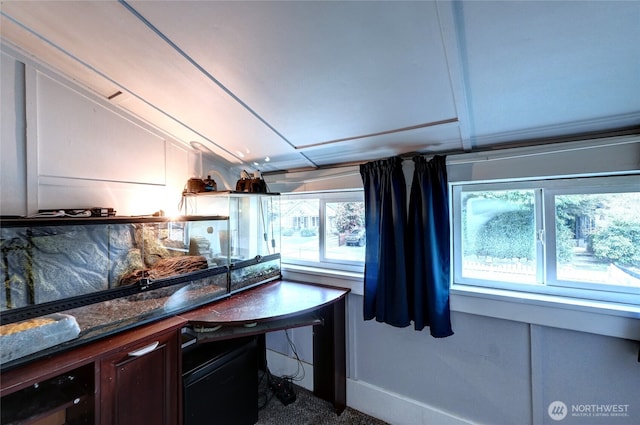 kitchen featuring tasteful backsplash, dark brown cabinets, wine cooler, and vaulted ceiling