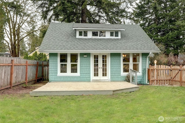 exterior space featuring french doors and a fenced backyard