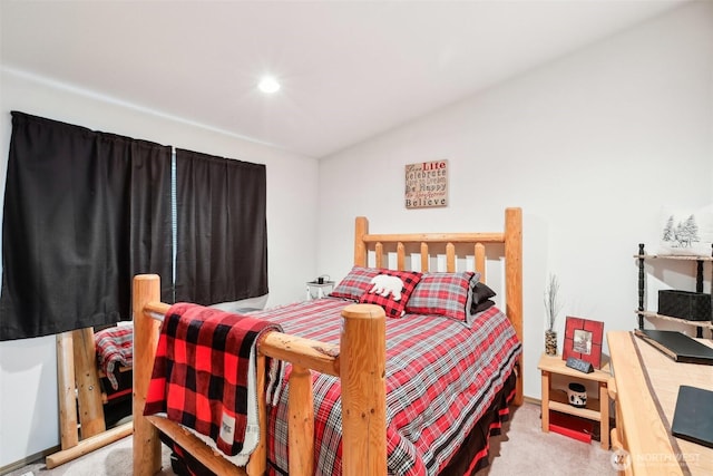 bedroom with carpet floors and recessed lighting