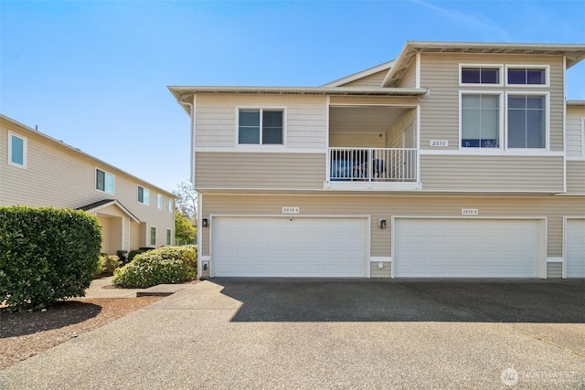 view of front of house with a garage and driveway