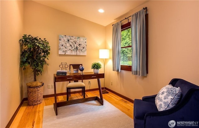 office area with recessed lighting, visible vents, baseboards, and wood finished floors