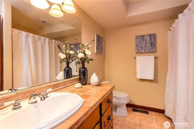 full bathroom with tile patterned flooring, toilet, vanity, visible vents, and baseboards