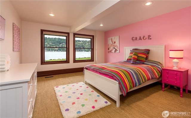 bedroom featuring recessed lighting, beam ceiling, visible vents, and baseboards