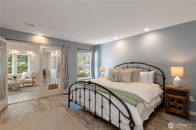 bedroom featuring french doors and recessed lighting