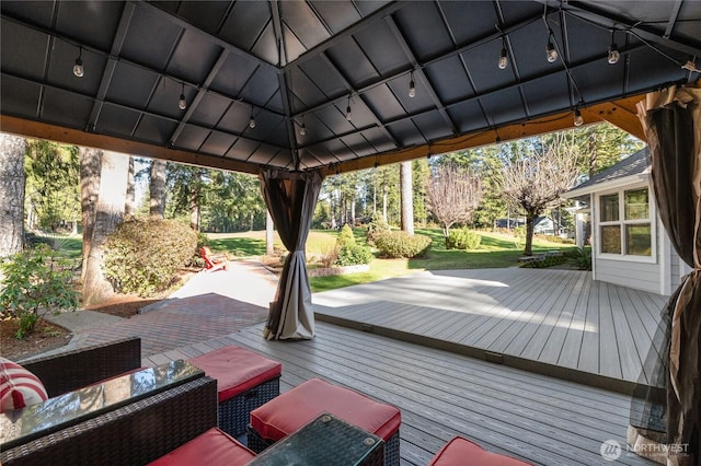 wooden terrace with a gazebo