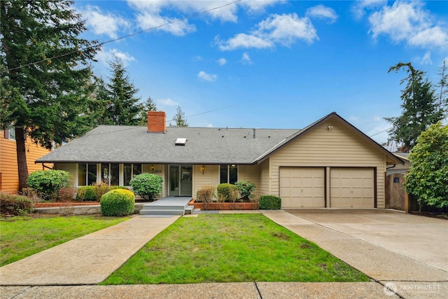 ranch-style house featuring a garage, concrete driveway, a chimney, roof with shingles, and a front lawn