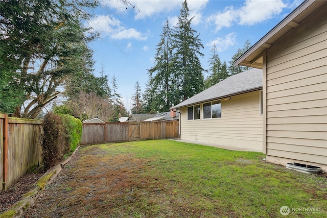 view of yard featuring a fenced backyard